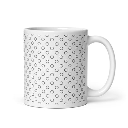 Circa — Orbit ceramic mug by Maude Mugs — circular orbital dot pattern in warm tones, 11oz, handle on right