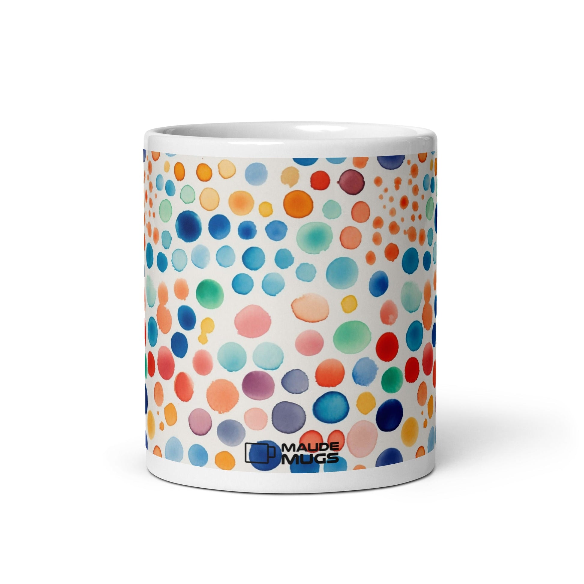 Dottie — Carnival ceramic mug by Maude Mugs — bold festive dot pattern in vibrant mixed tones, 11oz, front view