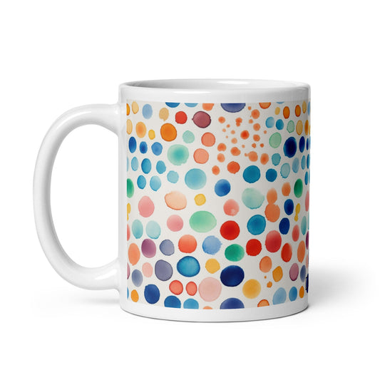 Dottie — Carnival ceramic mug by Maude Mugs — bold festive dot pattern in vibrant mixed tones, 11oz, handle on left