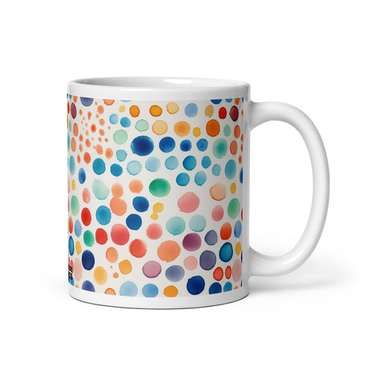 Dottie — Carnival ceramic mug by Maude Mugs — bold festive dot pattern in vibrant mixed tones, 11oz, handle on right