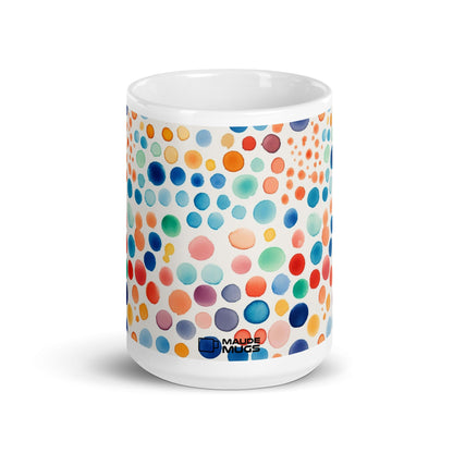 Dottie — Carnival ceramic mug by Maude Mugs — bold festive dot pattern in vibrant mixed tones, 15oz, front view