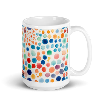 Dottie — Carnival ceramic mug by Maude Mugs — bold festive dot pattern in vibrant mixed tones, 15oz, handle on right